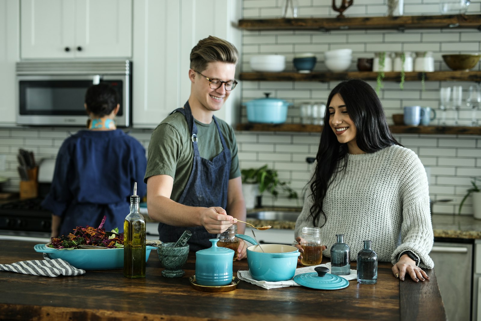 Two people preparing a healthy meal together at home